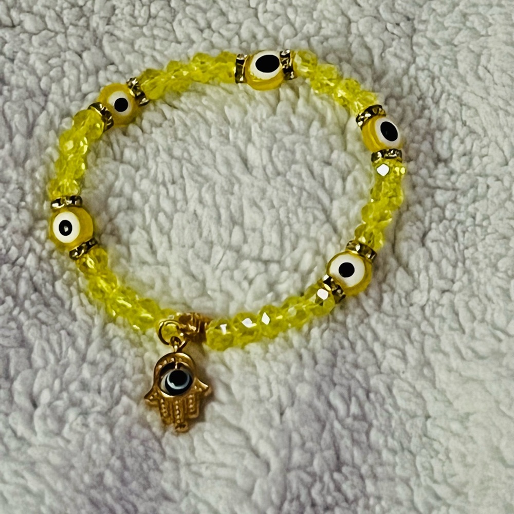 Stretchy 🧿 evil eye protection bracelet with hamsa charm